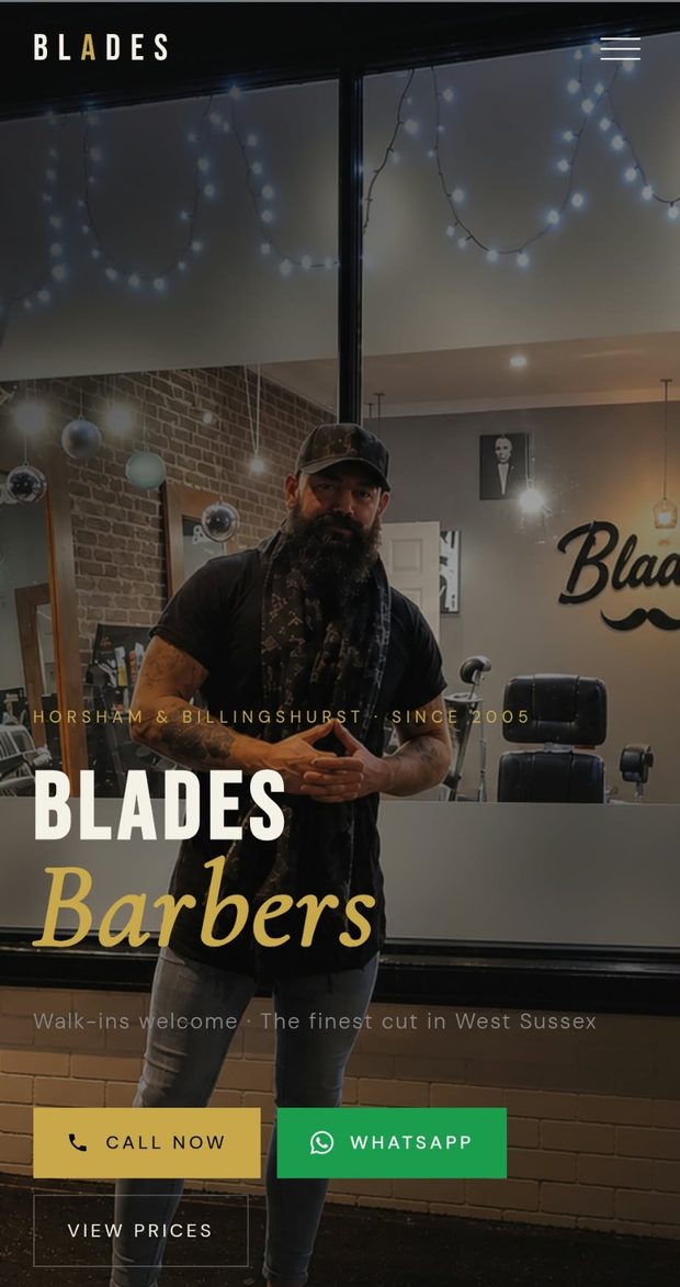 Blades Barbers website on a phone